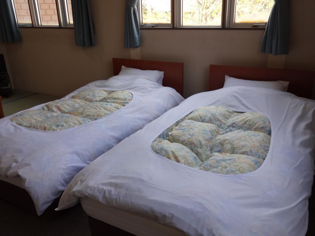 Oomukou Ryokan Hakuba Kamer foto